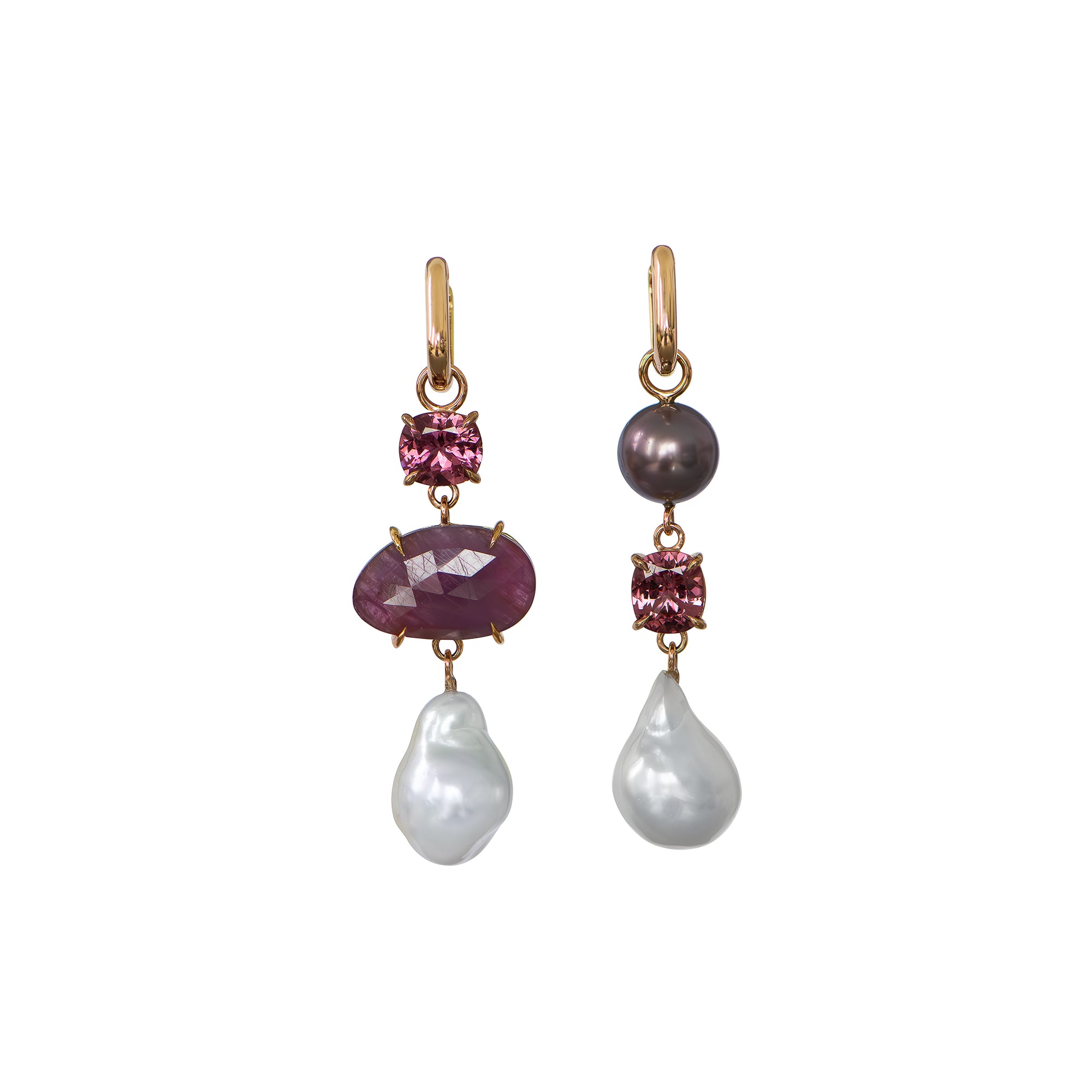 Yellow gold huggie earrings with ruby, pink garnet, a purple Tahitian pearl, and white South Sea pearls, displayed on a white background.