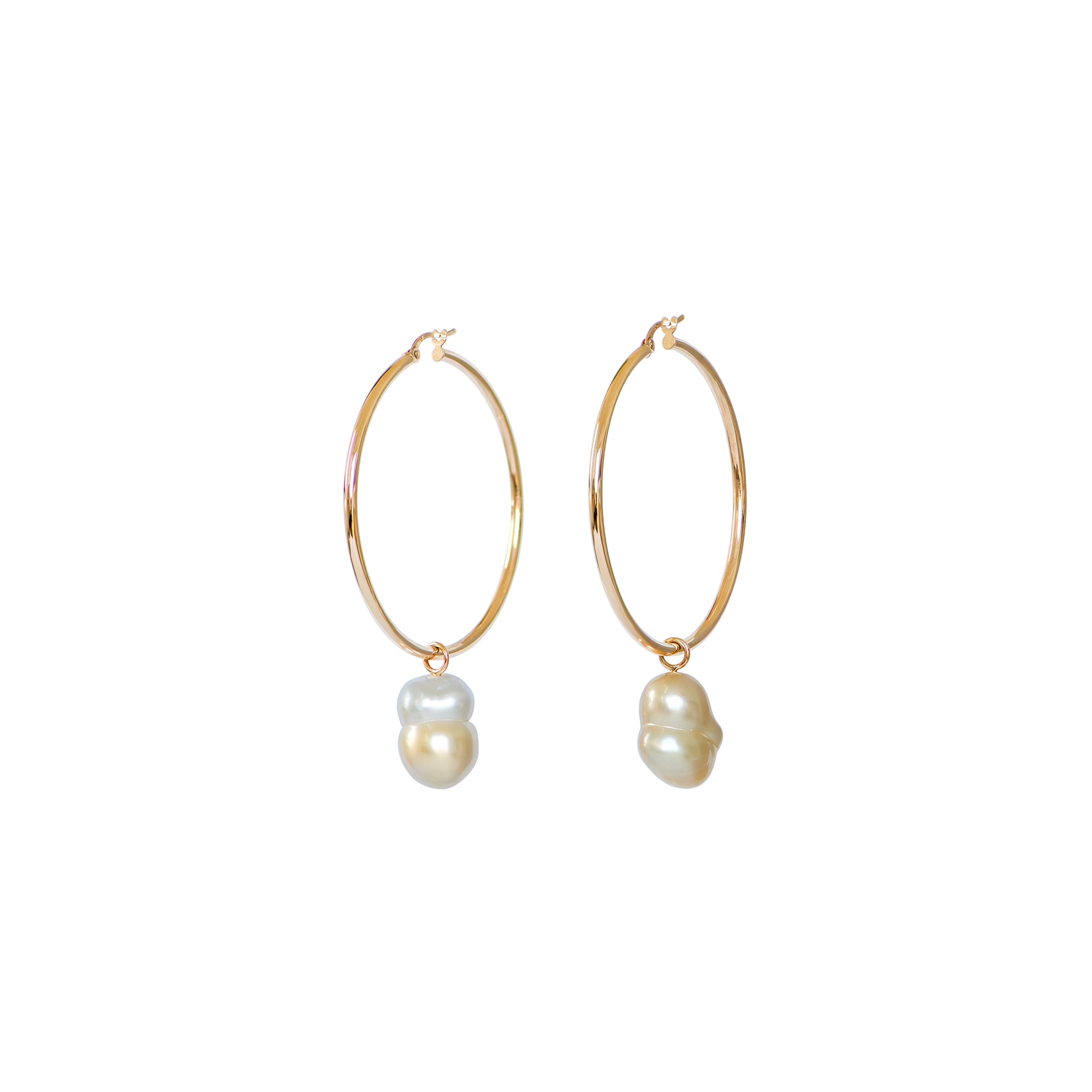 Hand selected unique baroque white and golden South Sea pearls, in a hand crafted yellow gold detachable setting, on large yellow gold high polish hoop earrings, displayed on a white background.
